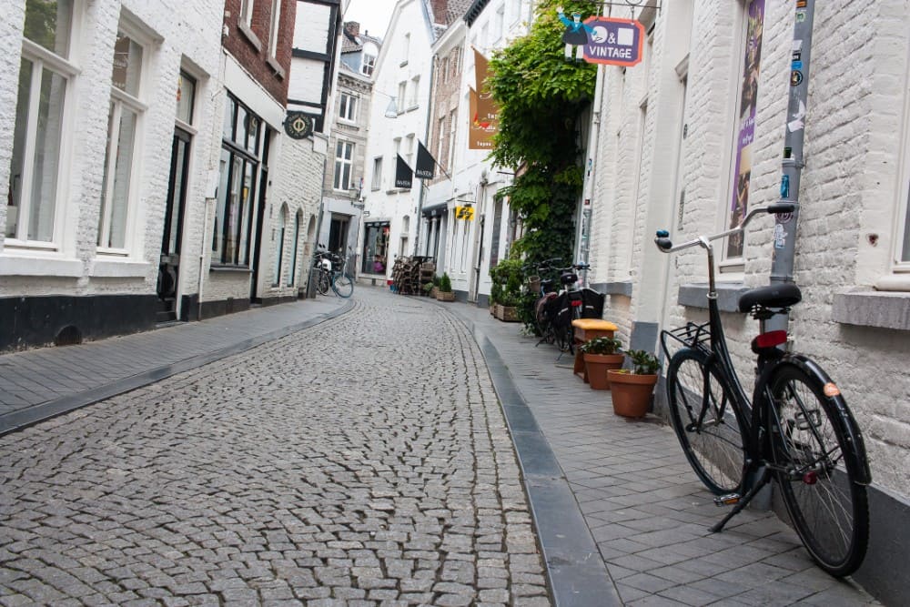 Winding street with bicycles - in Maastricht, Netherlands.