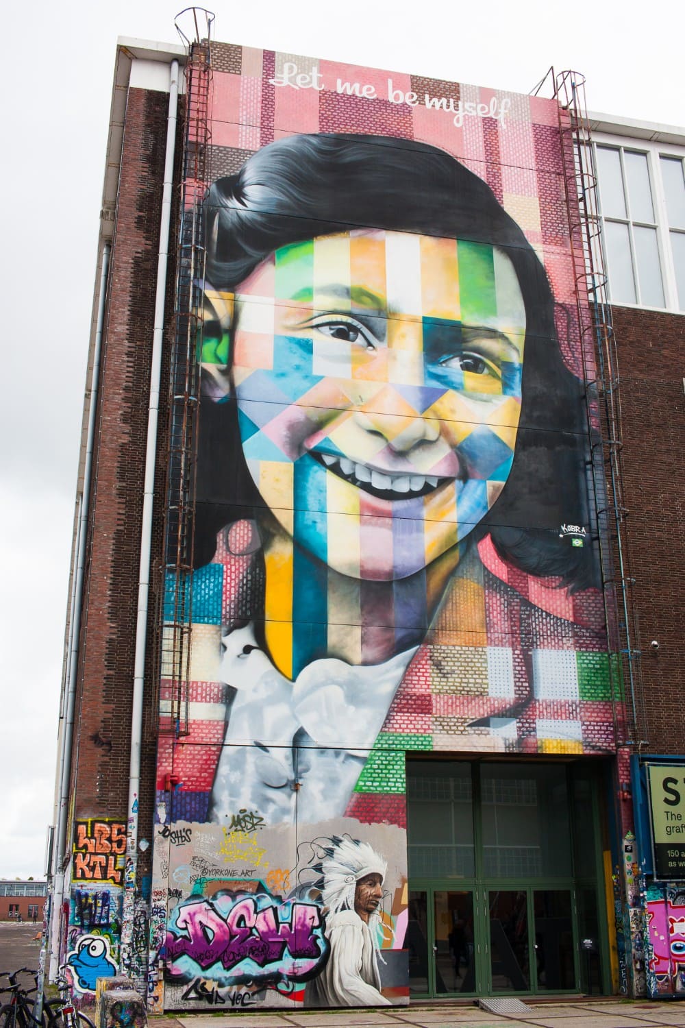 Anne Frank mural mural stating "Let me be myself" - outside of the STRAAT Museum in Amsterdam-Noord in the Netherlands.